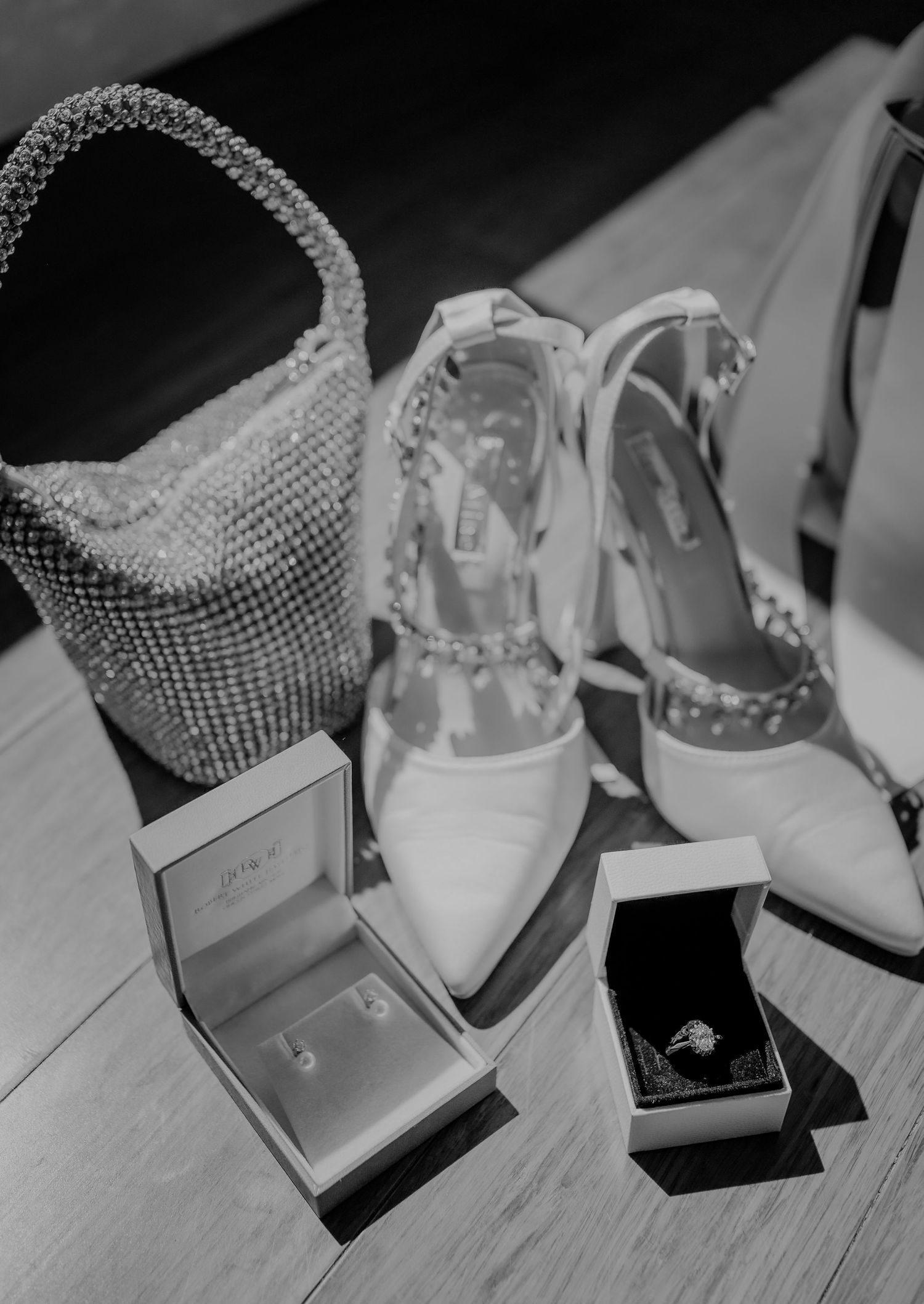 Brisbane wedding photographer — black and white flat lay of wedding shoes, rings and accessories, beautiful styled wedding detail shot by Jo