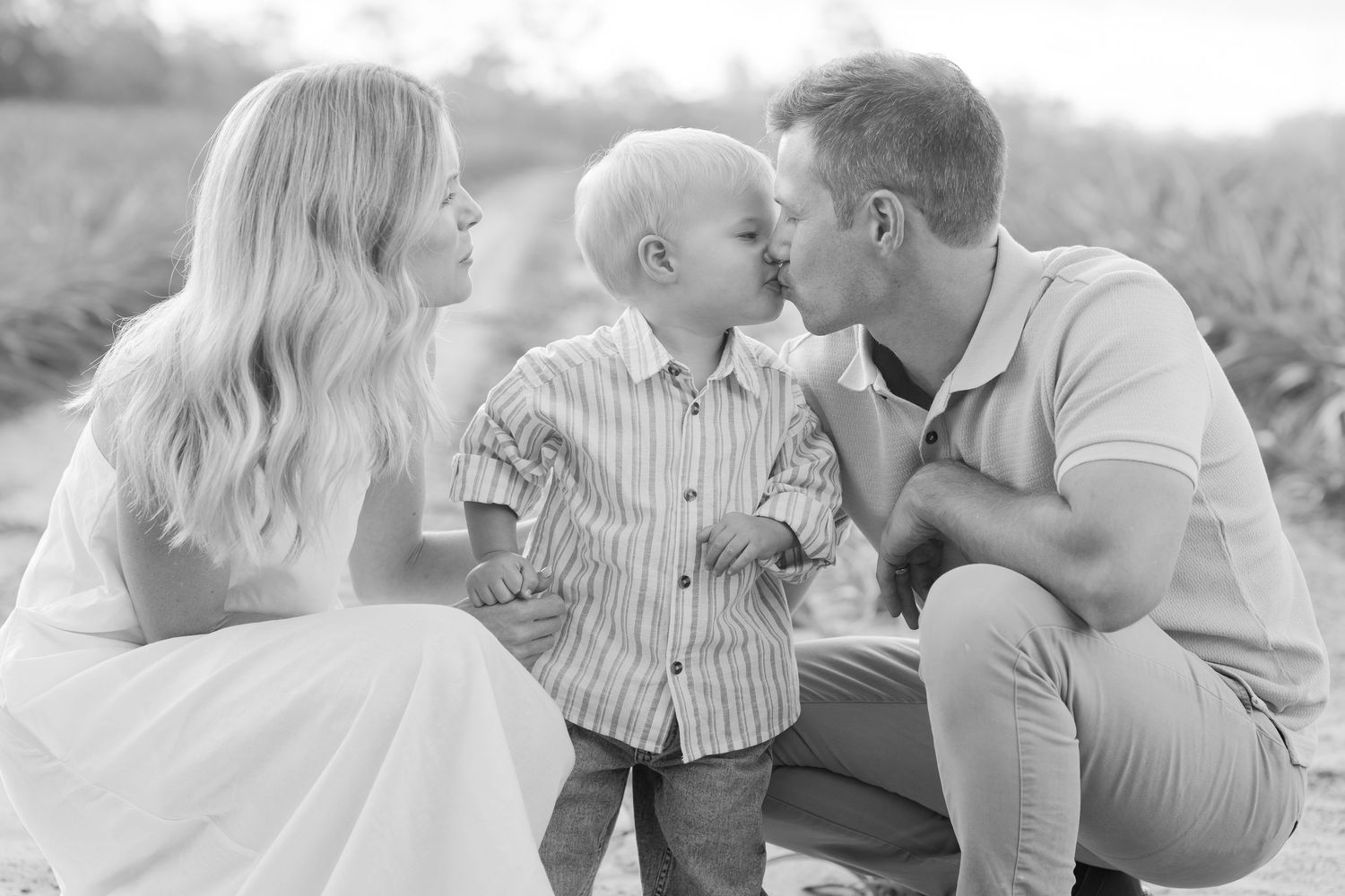 Brisbane family photographer — couple sitting together outdoors, relaxed and connected lifestyle portrait by Joy Filled Photography Brisbane