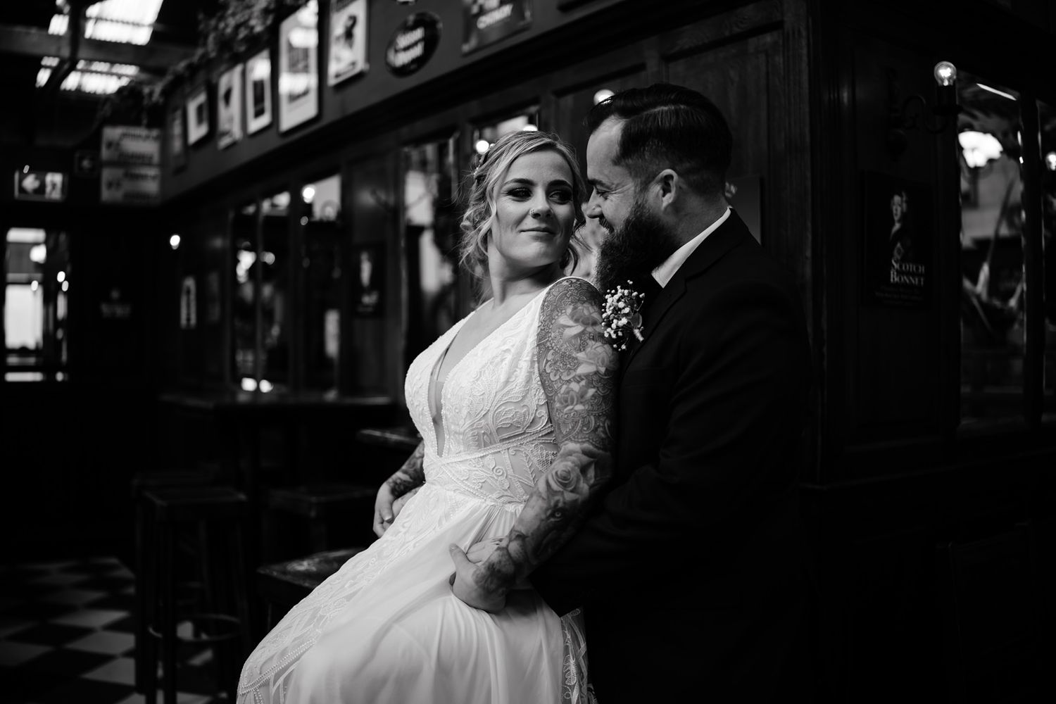 An intimate black and white portrait of a couple in vintage-inspired wedding attire in Niagara.