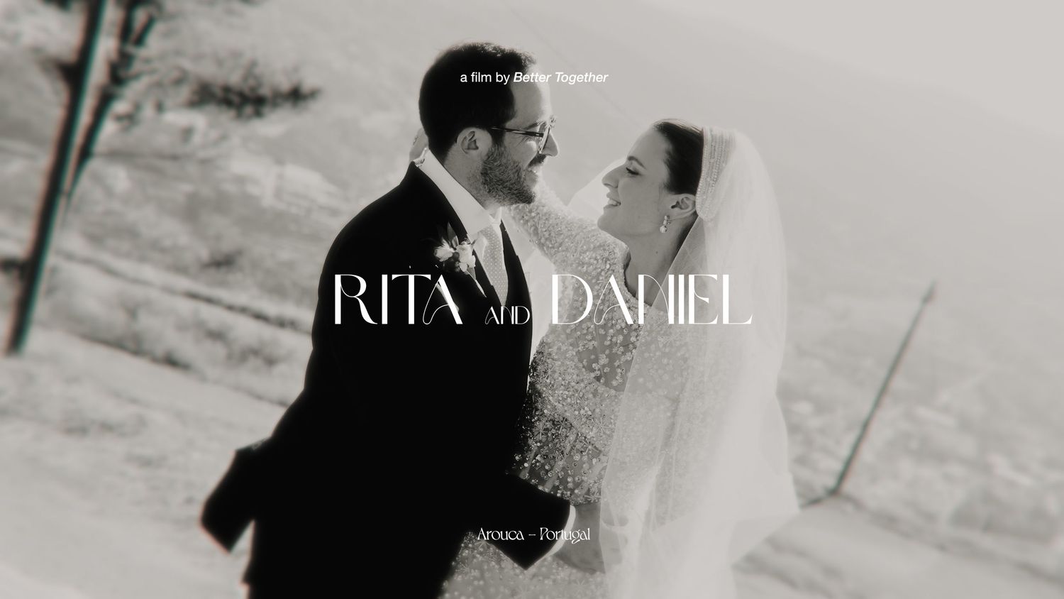 Elegant black and white wedding film title card reading Rita and Daniel with a snowy backdrop.