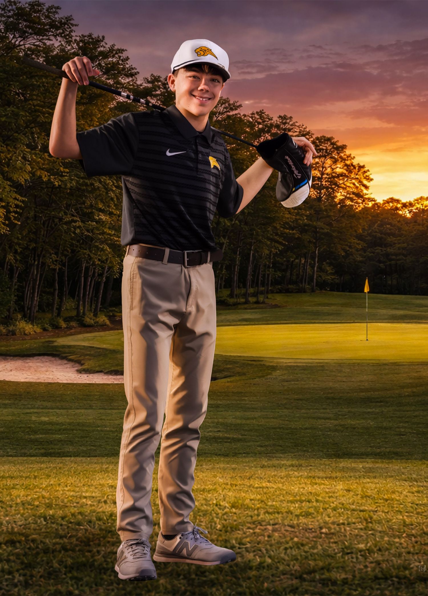 Golfer posing at sunset on a scenic golf course with golden light illuminating the green and trees.