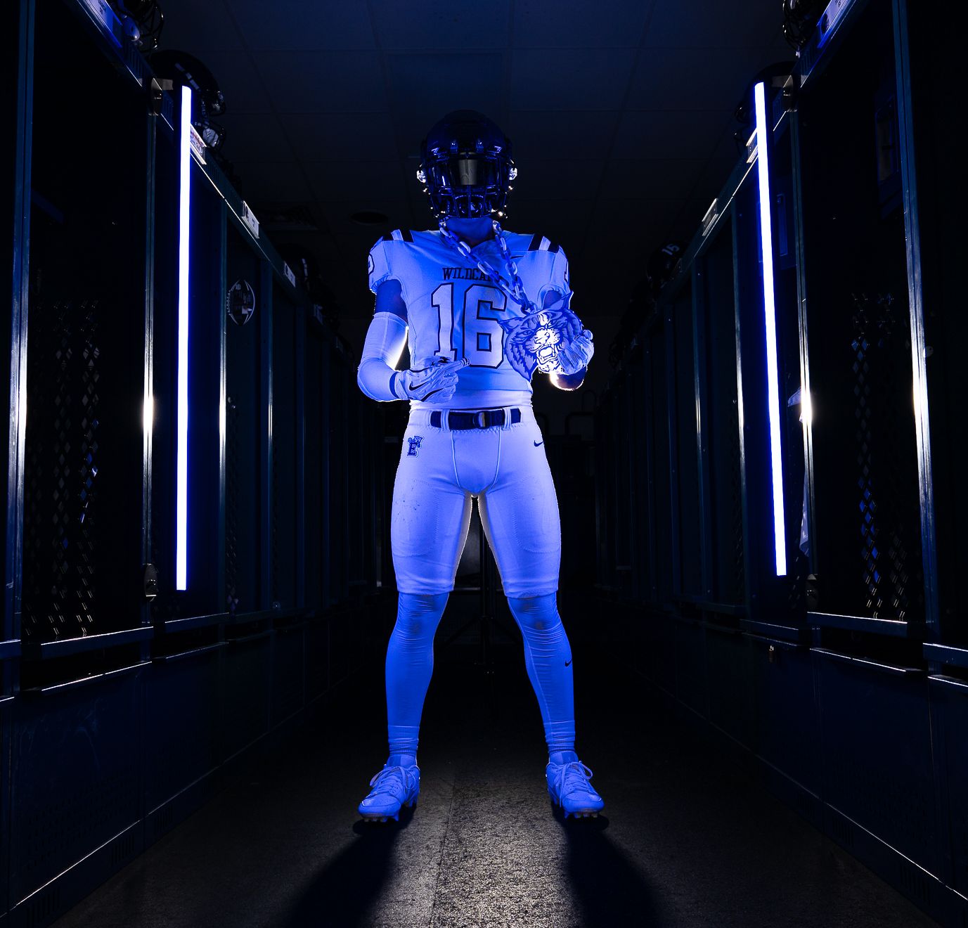 A series of dark corridor shots with blue lighting and astronaut figures creating an eerie sci-fi atmosphere.
