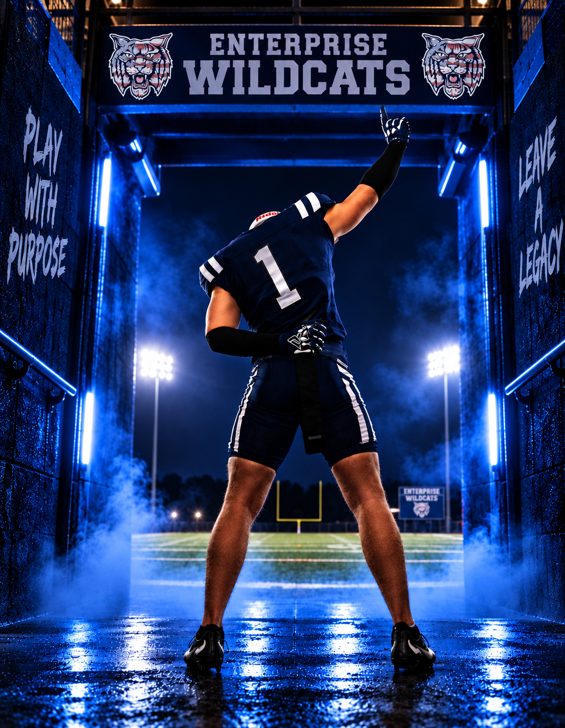 Enterprise Wildcats football player #1 poses dramatically in tunnel with blue lights and fog on a rainy night.