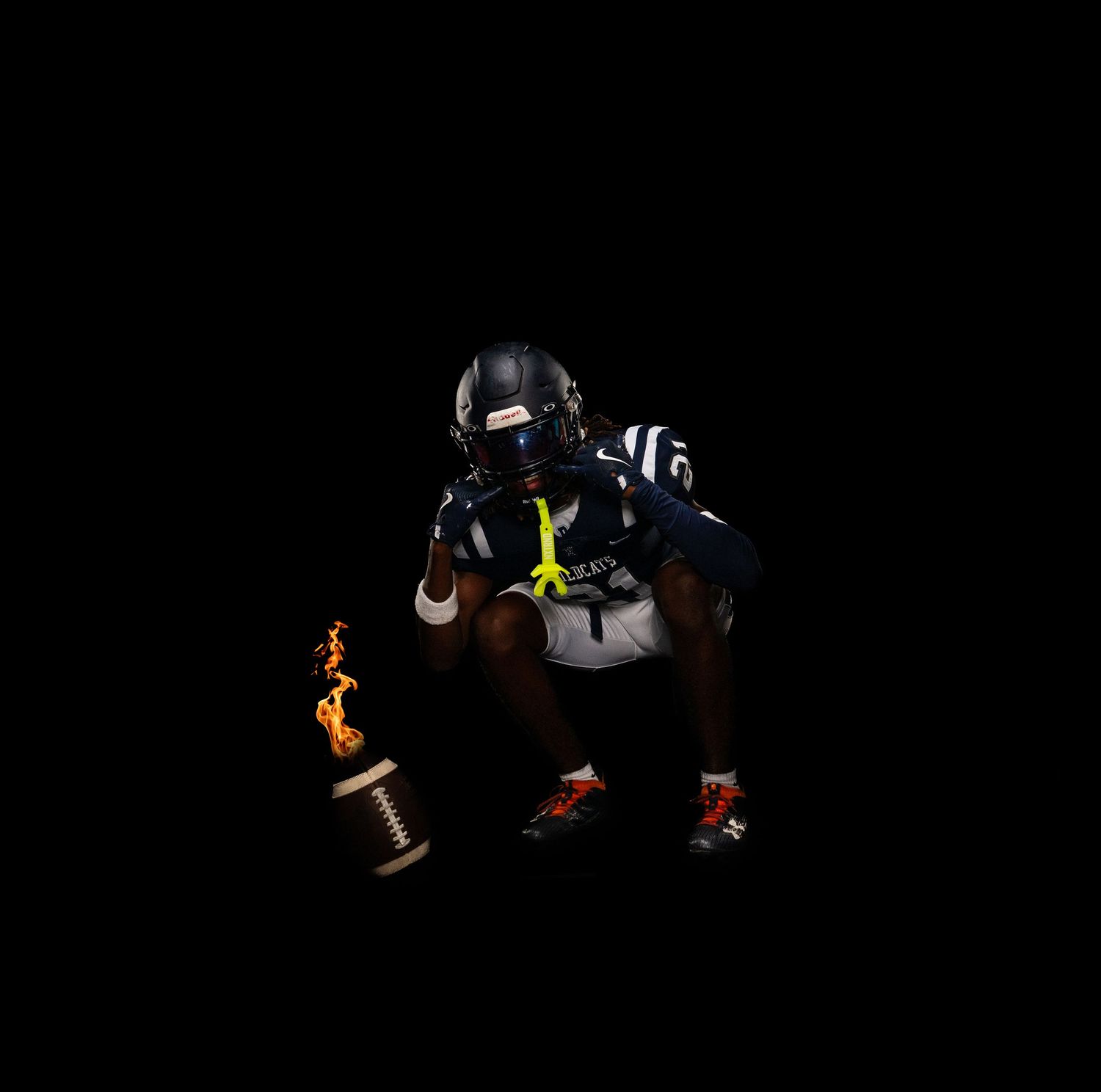Silhouetted figures in dynamic sports action poses against dark background.