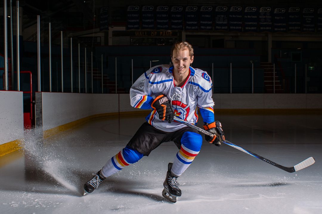 BCIHL Okanagan Lakers stops quickly for an action shot in their Salute to Services jerseys