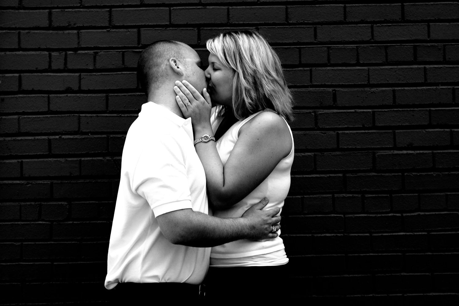 Black and white artistic photo series showing silhouettes against a brick wall.