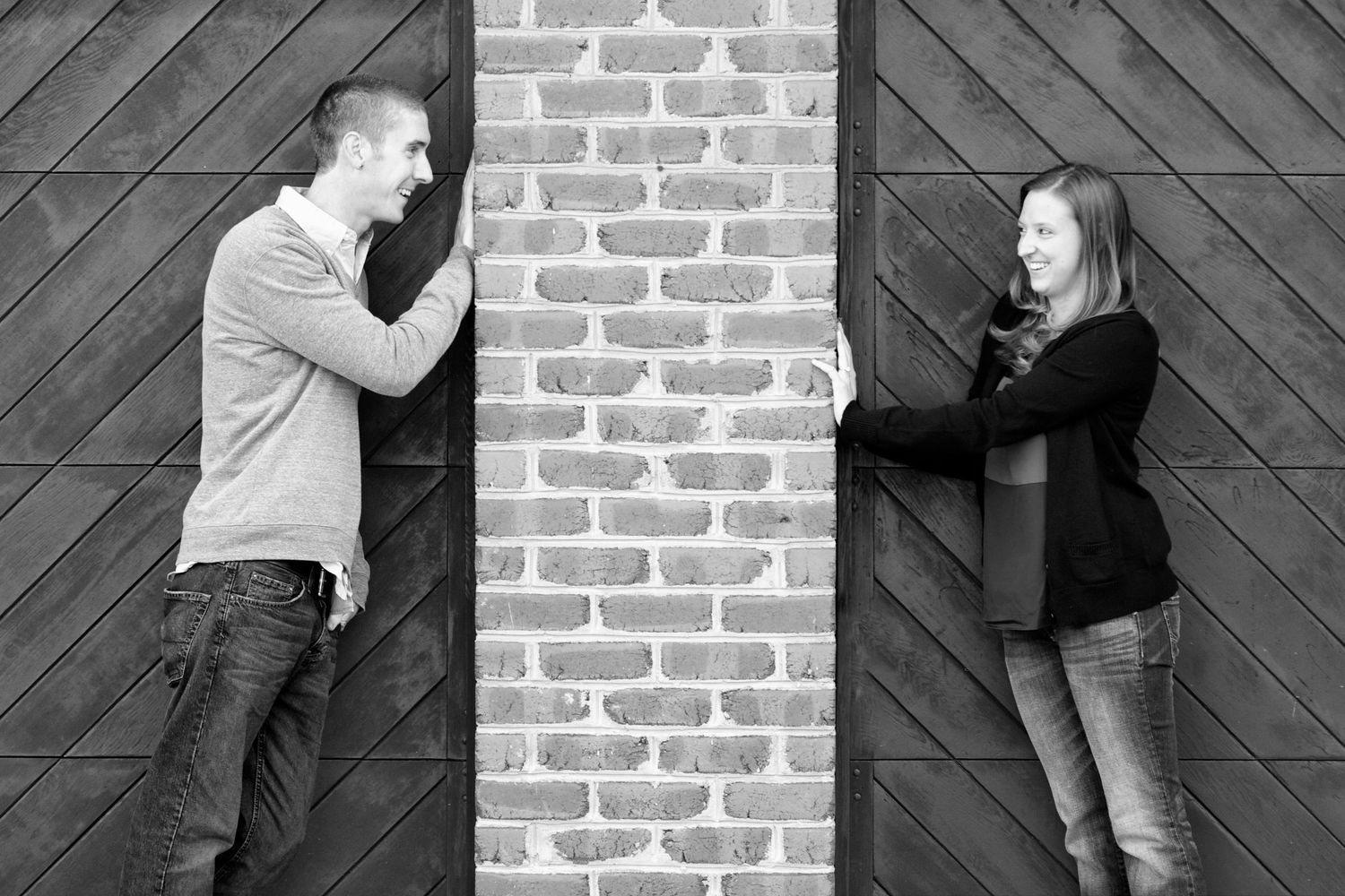 Series of romantic couple poses against a rustic wooden and brick backdrop.