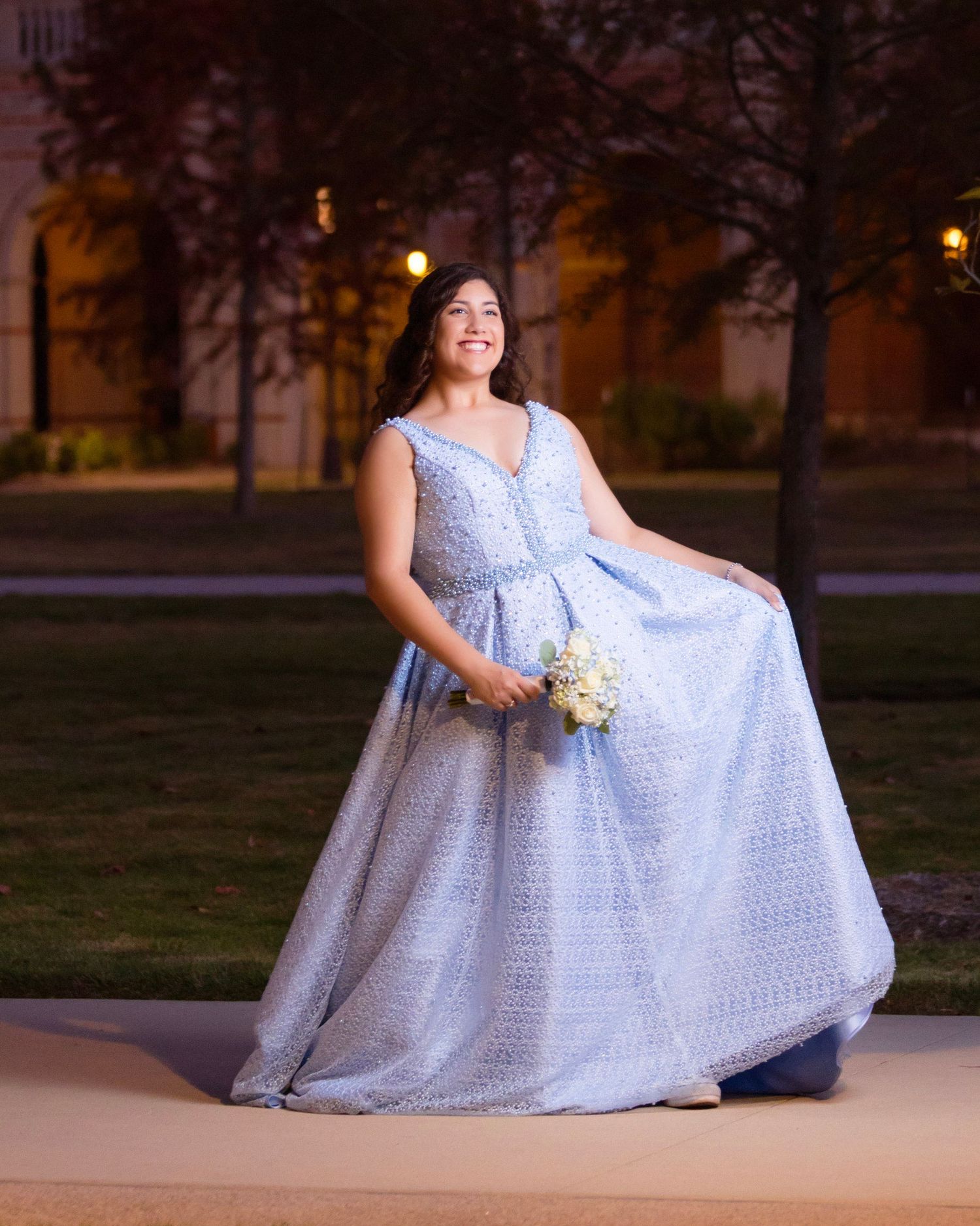 Quinceanera portrait of a teen girl in with off camera flash