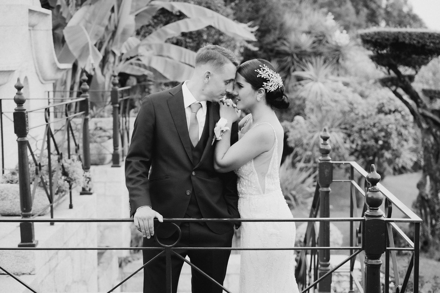 A series of black and white wedding photographs showing couples celebrating their special moments outdoors.