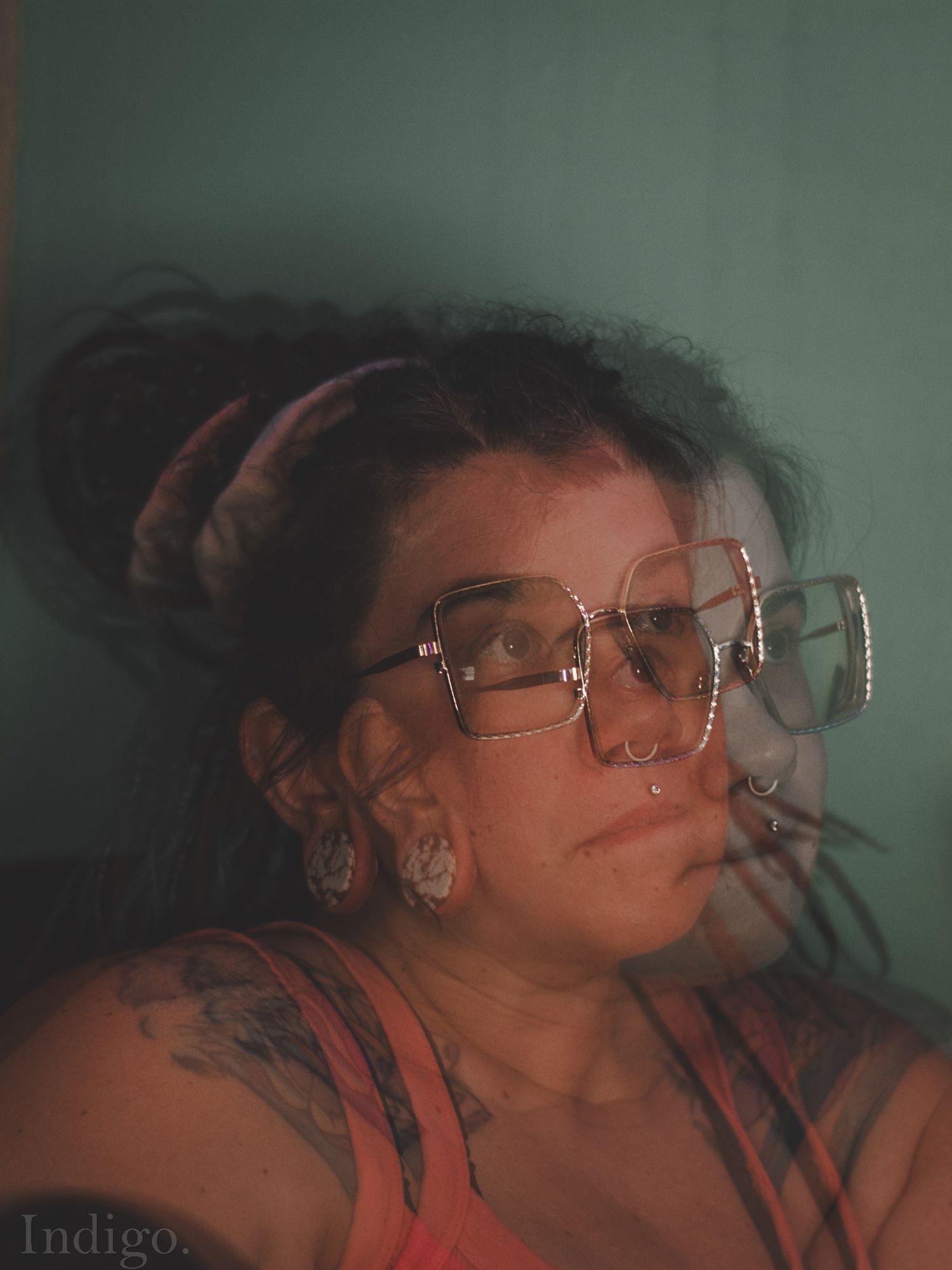 Multiple exposure portrait with warm tones and overlapping images.