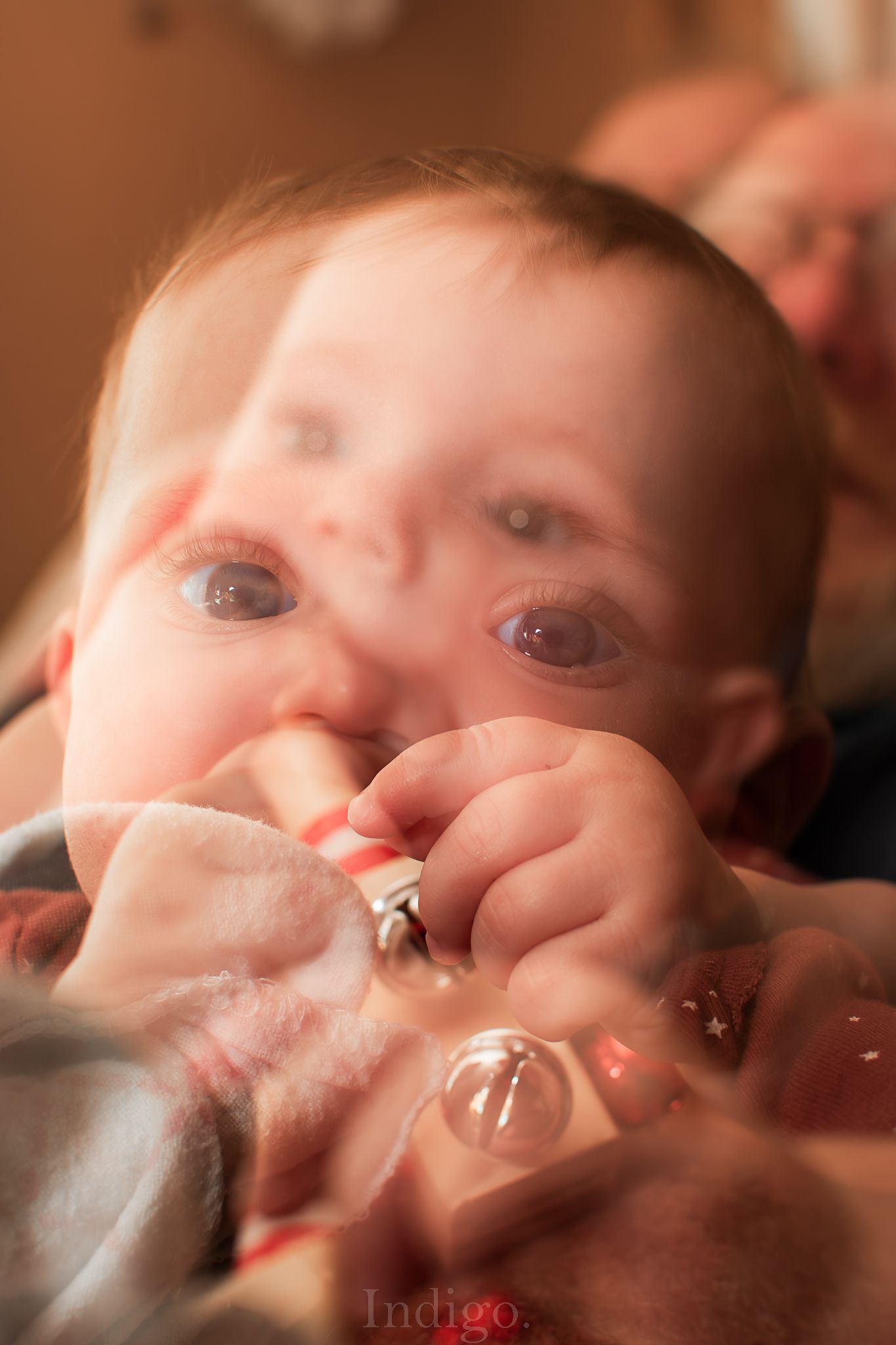 Soft focus close-up shot with warm tones and blurred motion effects.