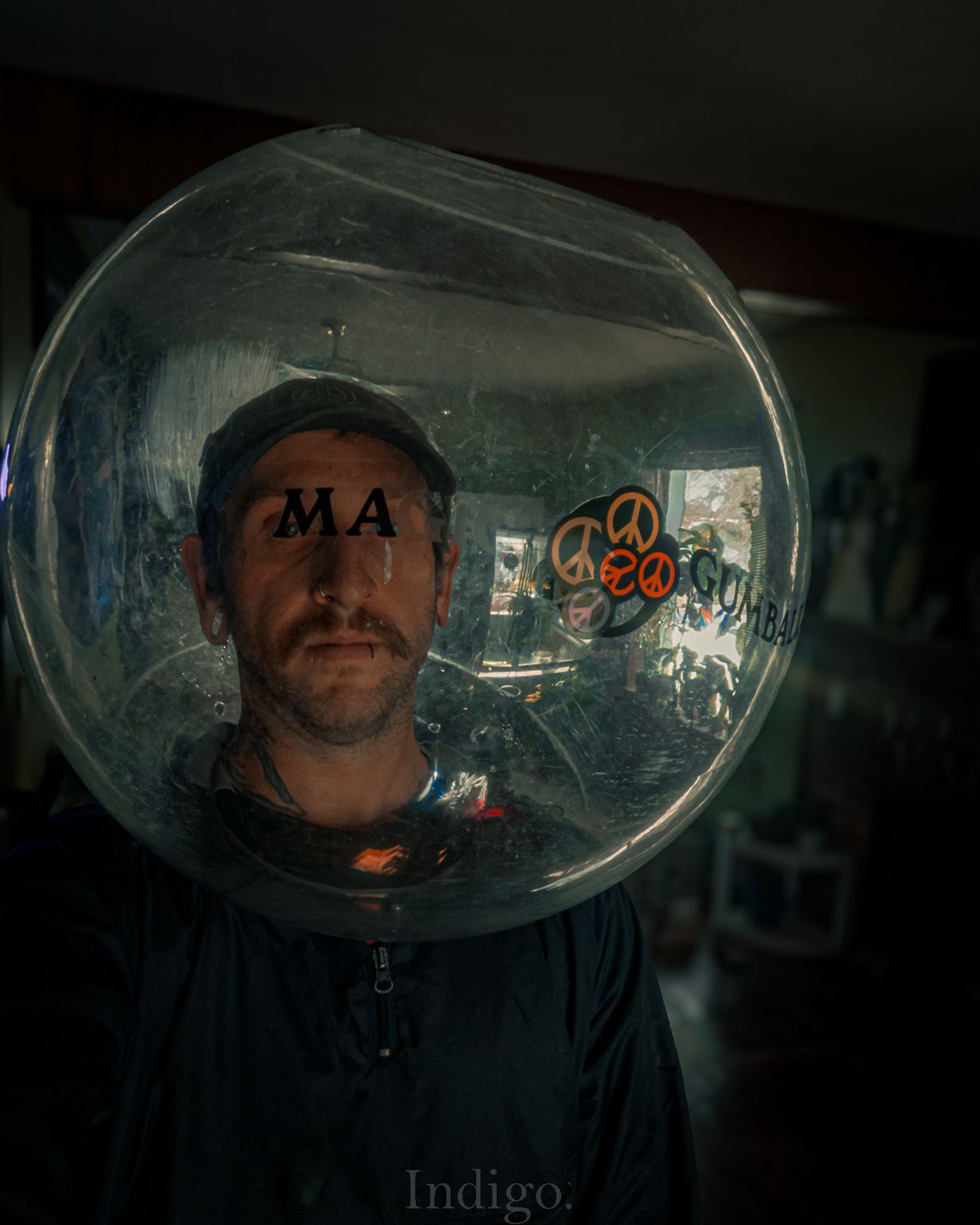 Dark atmospheric shot of goggles or protective eyewear with reflective surfaces.