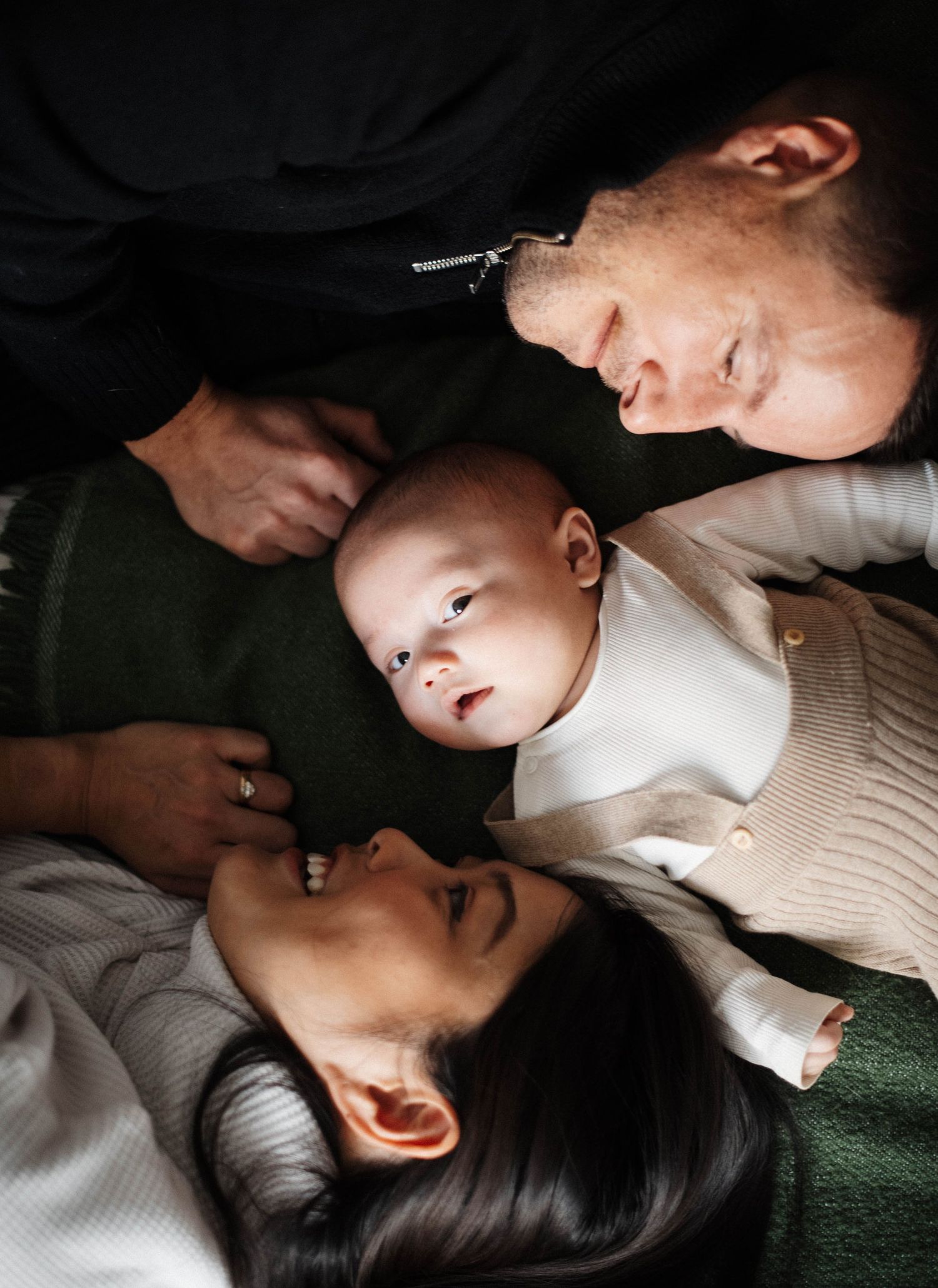 Lifestyle family photo taken in a bright, natural light home setting
