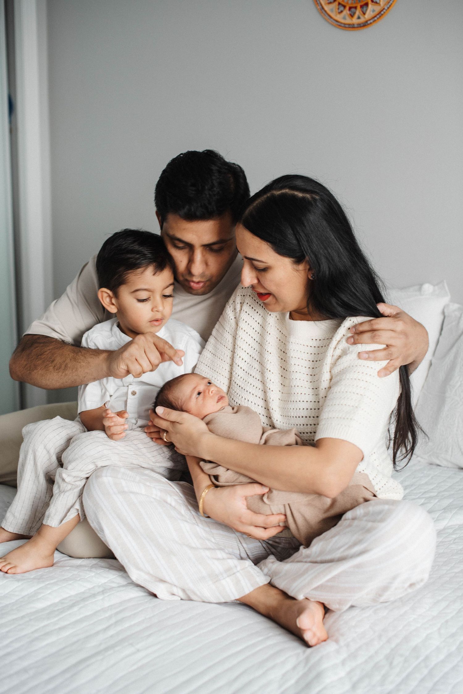 In-home newborn photographer in Mississauga using natural window light