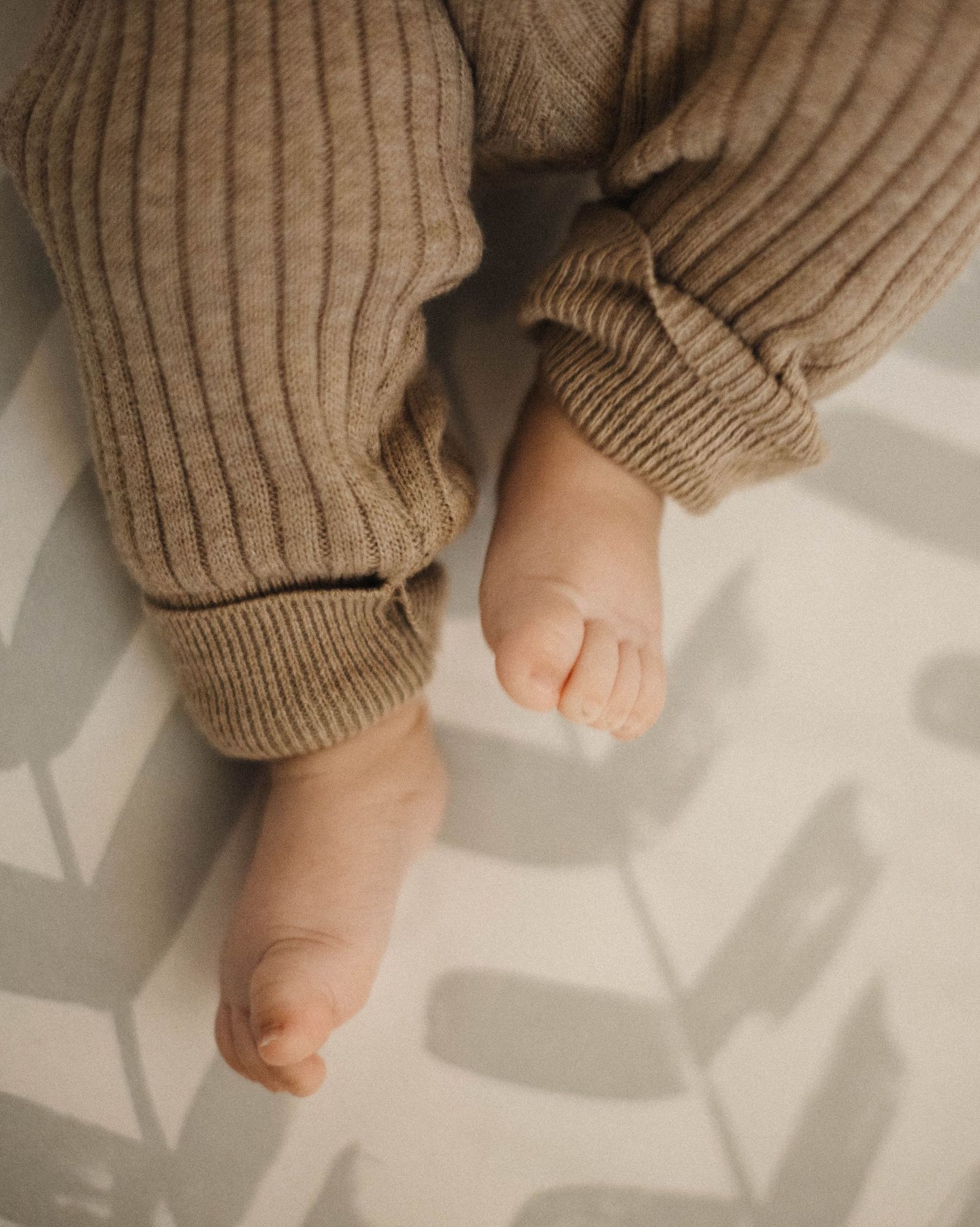 Oakville family photography client portrait during a lifestyle session tiny feet