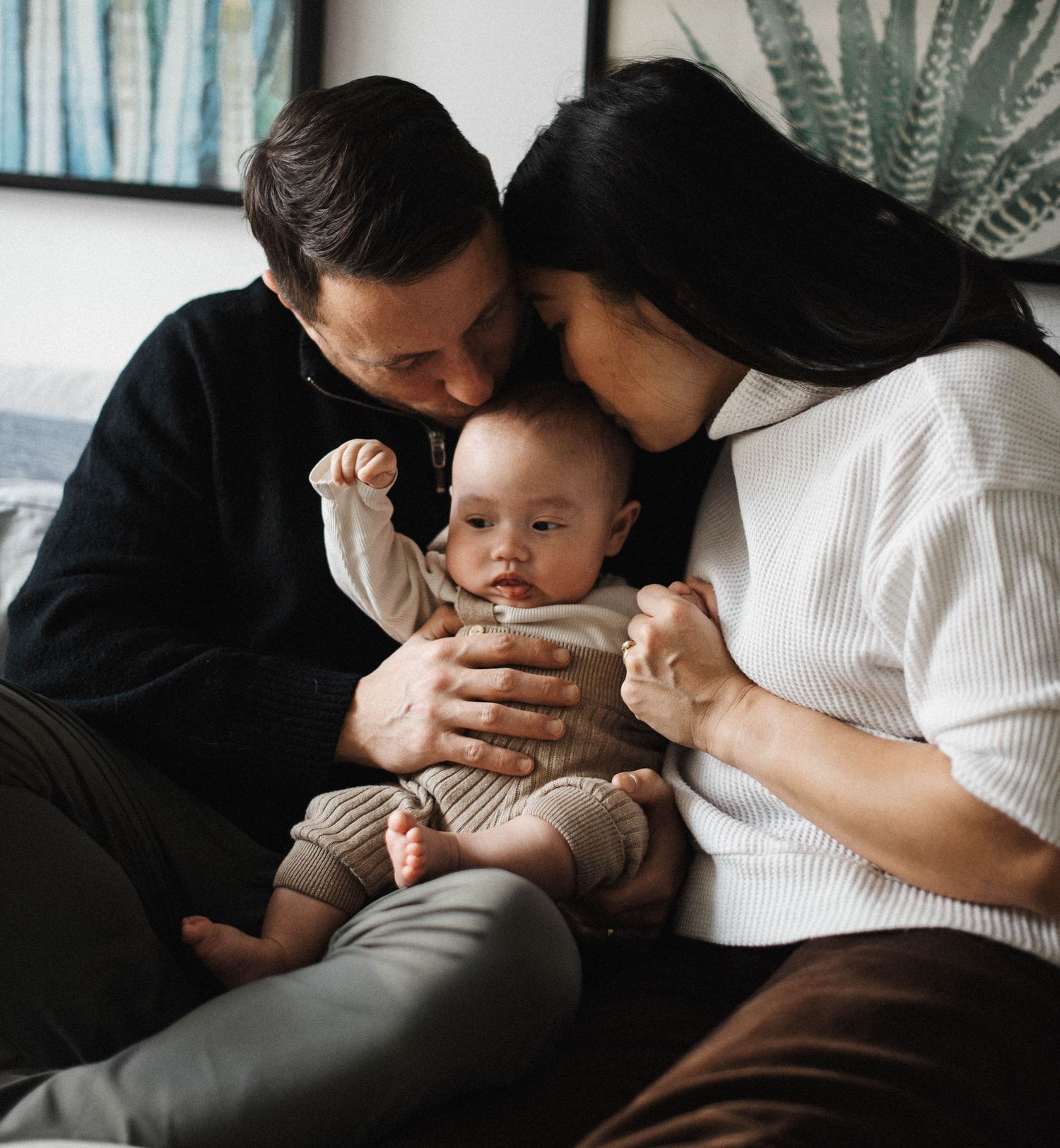 Family playing together during a relaxed in-home photography session