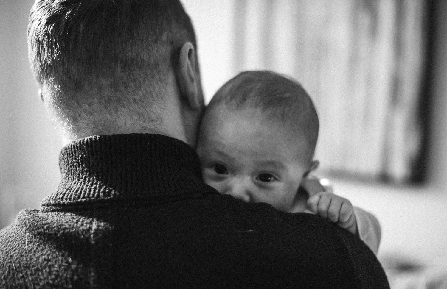 Lifestyle baby photography capturing a tender father and baby connection in Mississauga