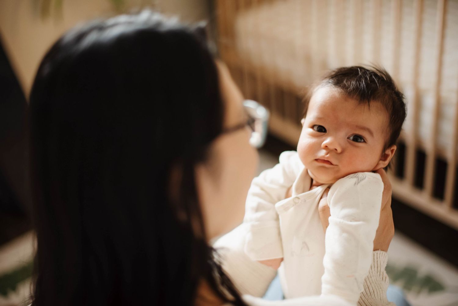 Lifestyle maternity photography in Oakville celebrating motherhood at home
