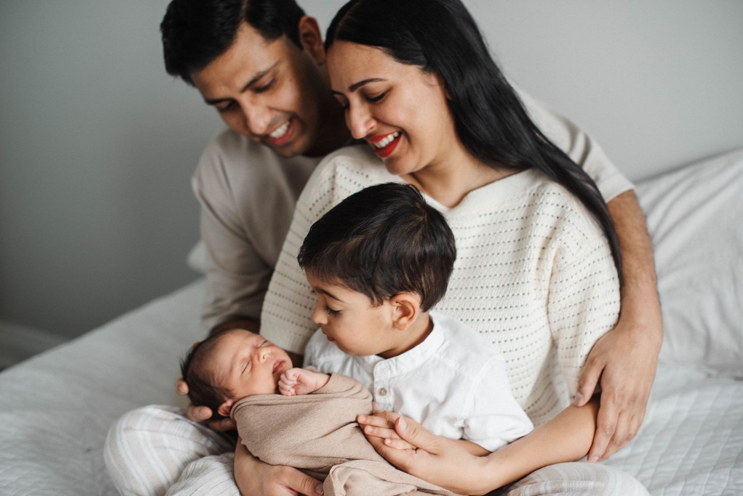 Mississauga lifestyle family photo of parents smiling with their children