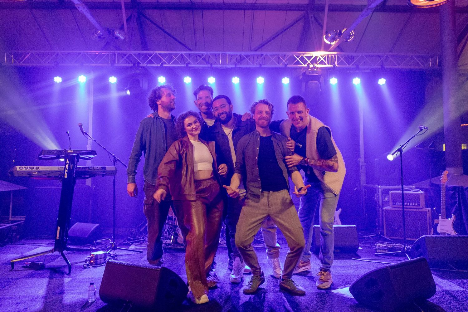 Eventfotografie van het personeelsfeest van het Scala College in Alphen aan den Rijn, vastgelegd met sfeervolle momenten en interactie.