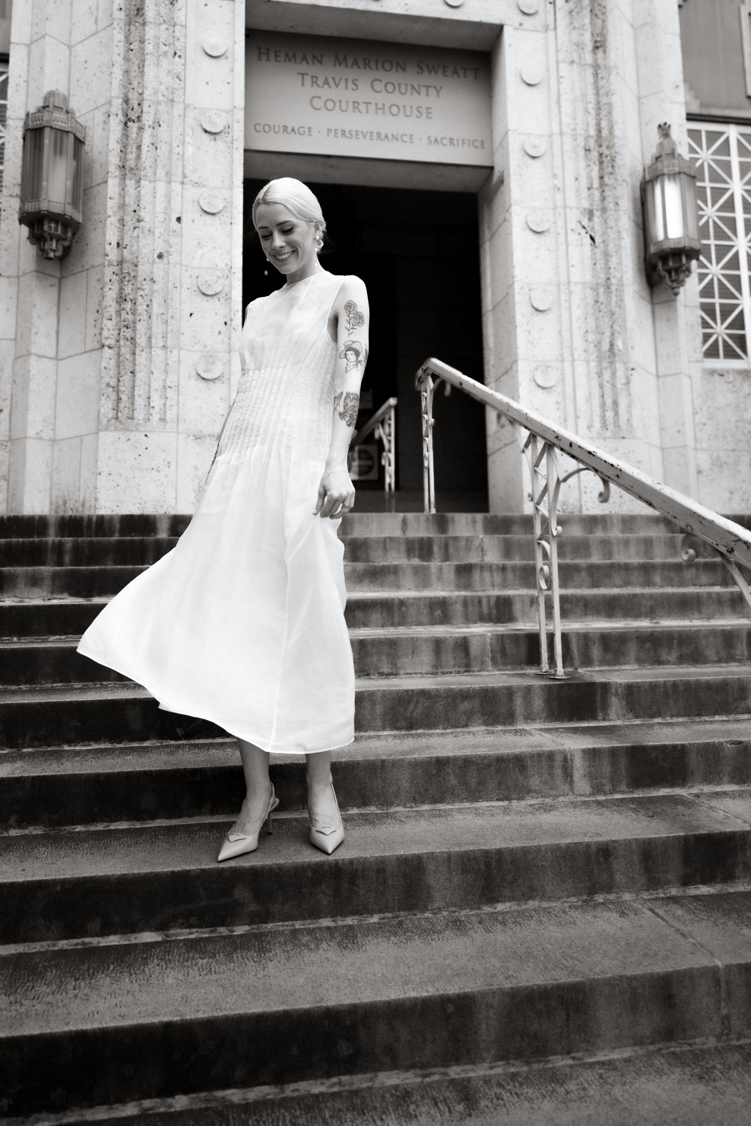 Courthouse wedding modern bride on steps of Travis County Courthouse in Austin Texas