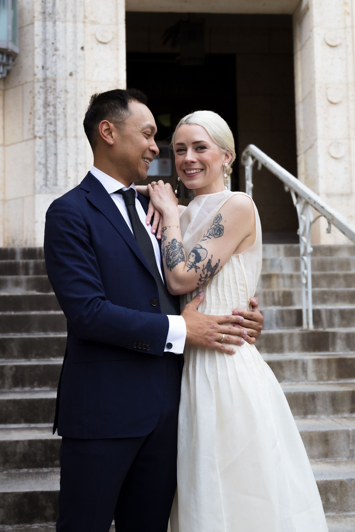 Couple poses after courthouse wedding in Austin, Texas