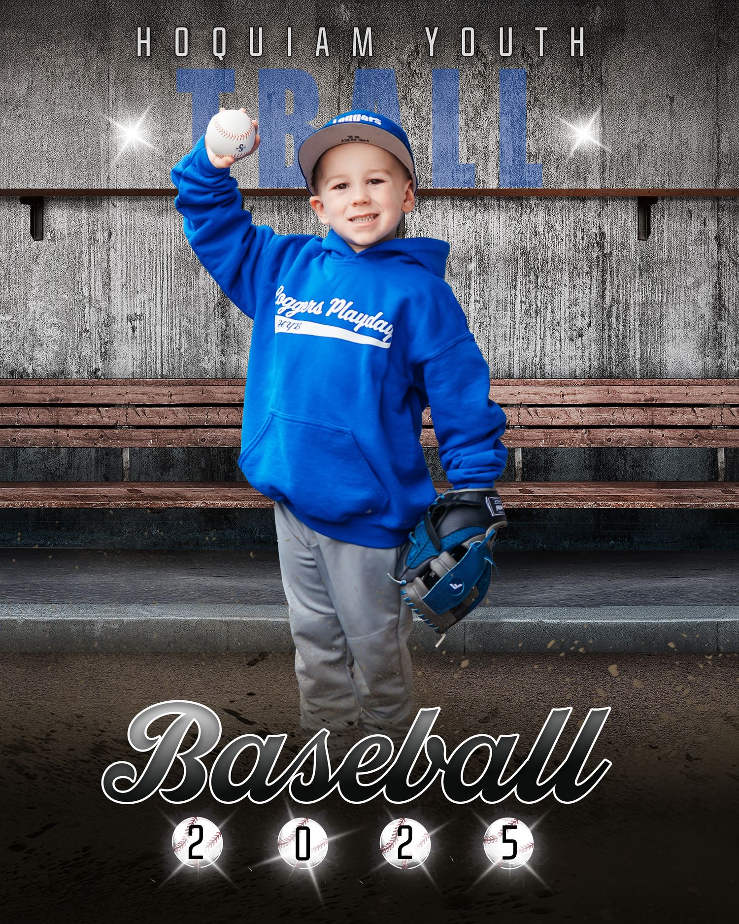 Young baseball player in blue sweatshirt poses with glove in dugout for youth sports portrait.