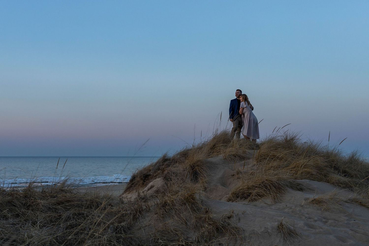 A series of seven tranquil beach landscape photos showing sand dunes and ocean views at sunset.