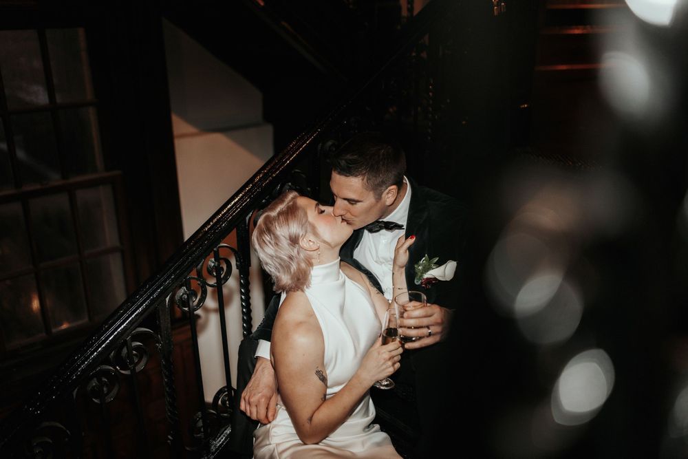 Intimate dance moment captured in dark, moody lighting with romantic atmosphere.