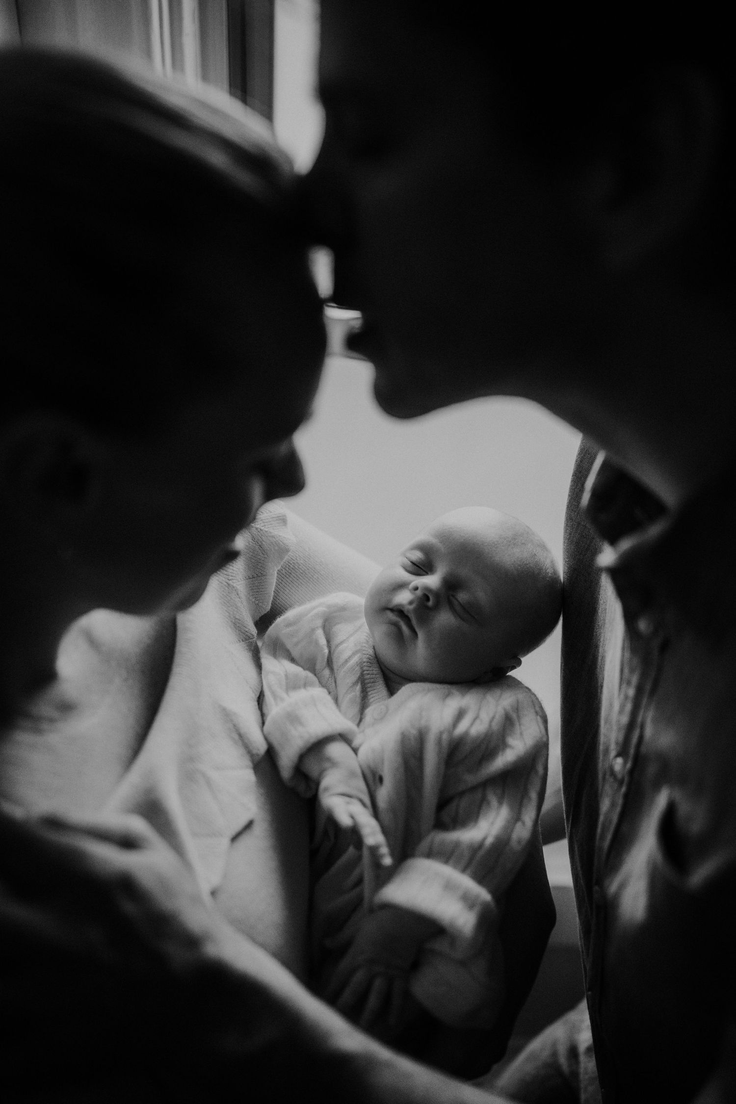 Intimate black and white close-up photo sequence.