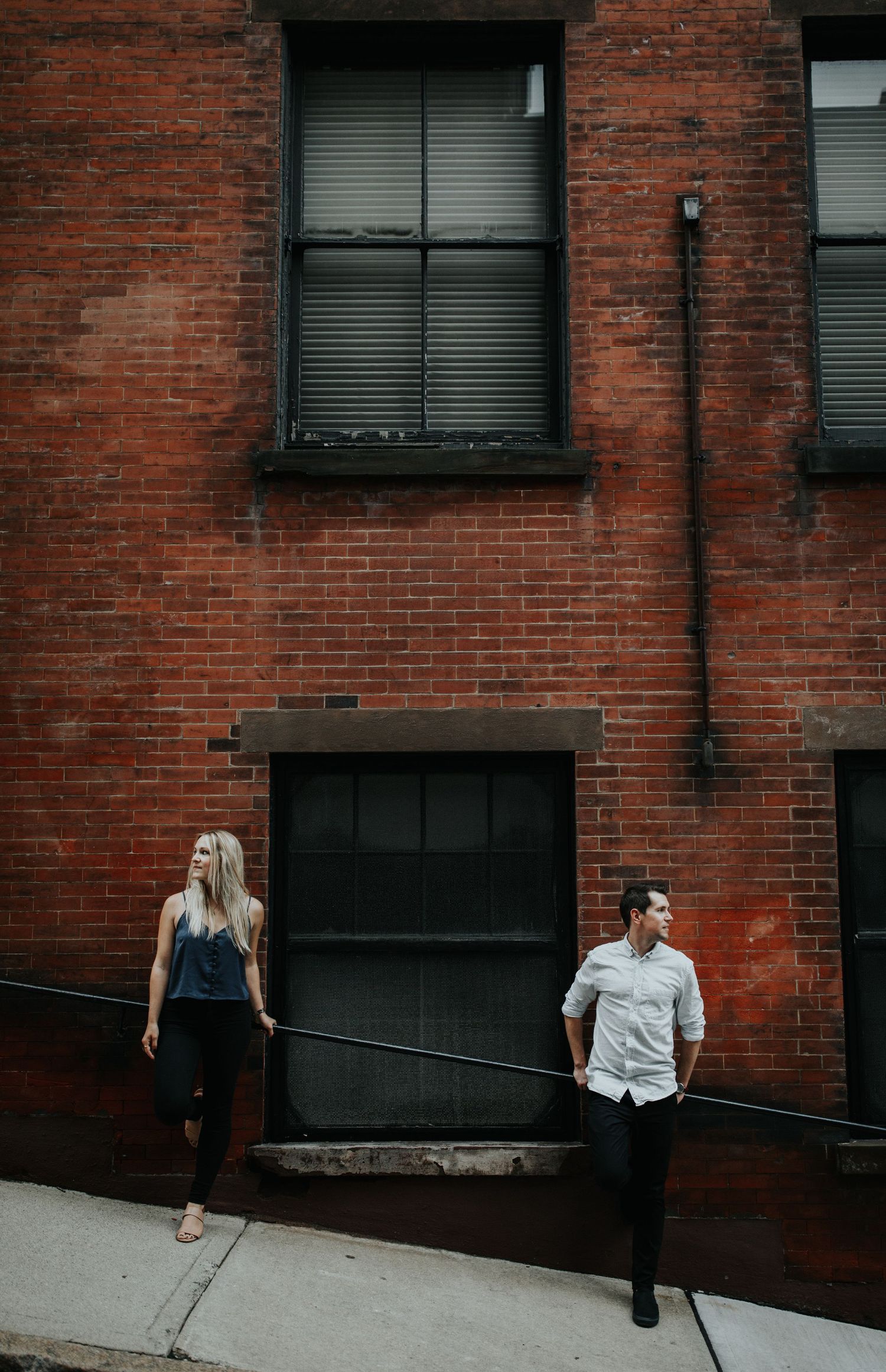 A sequence of photos against a red brick wall showing progressive movement.