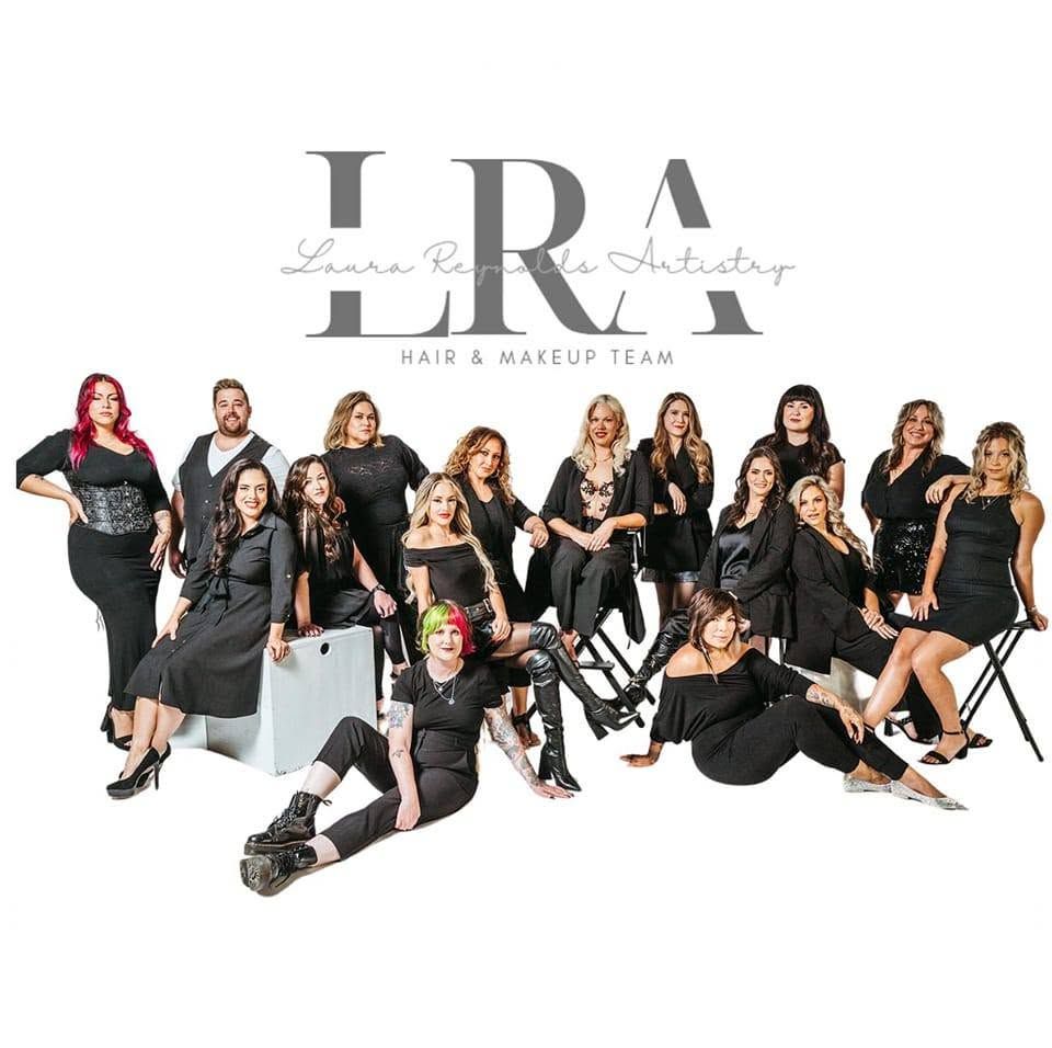 LRA Hair and Makeup Team group photo featuring stylists dressed in black against a white background.