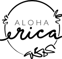 Aloha Erica brand logo with elegant script lettering inside a circular botanical frame design.