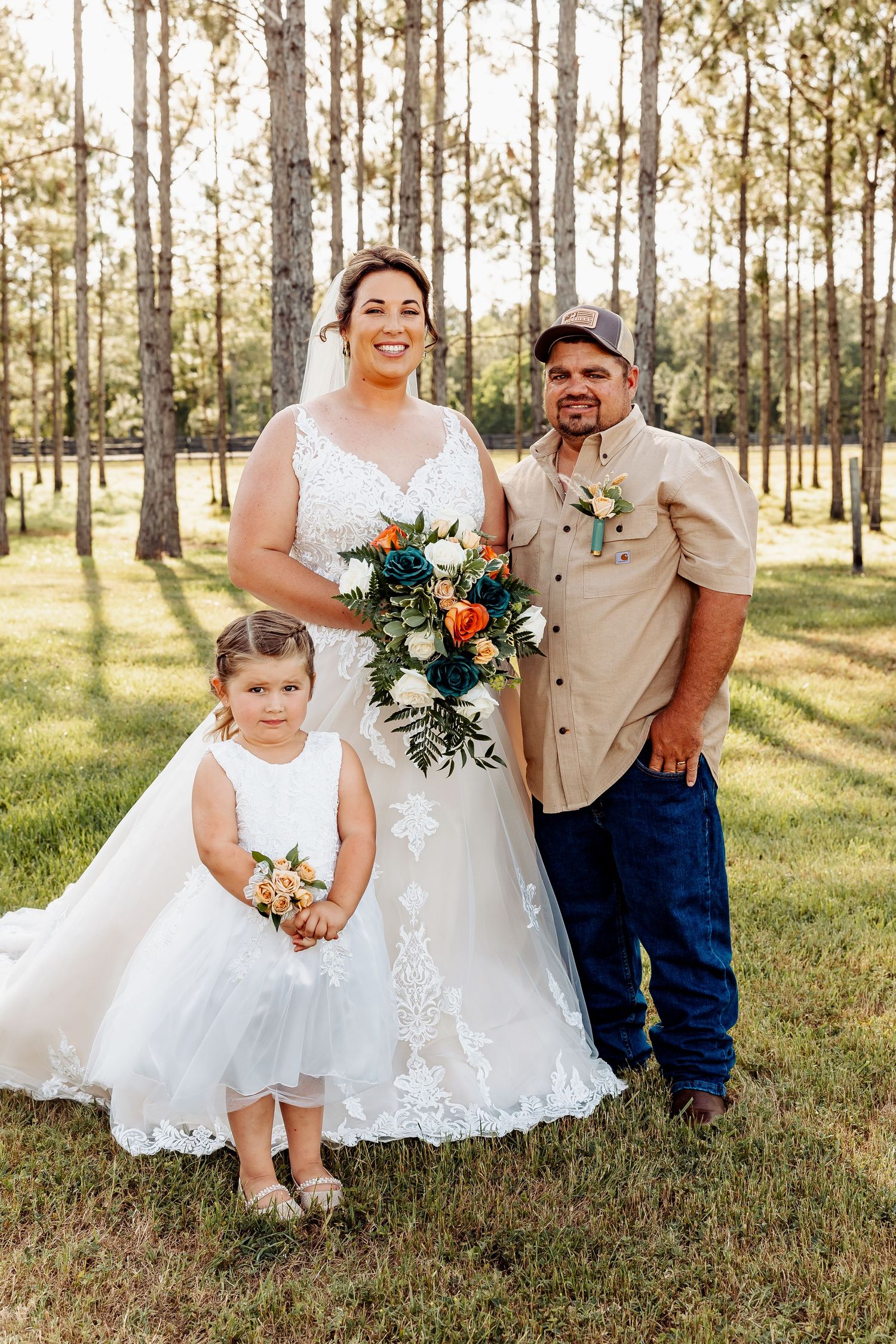 Beautiful outdoor wedding photo in a pine forest with rustic country style.