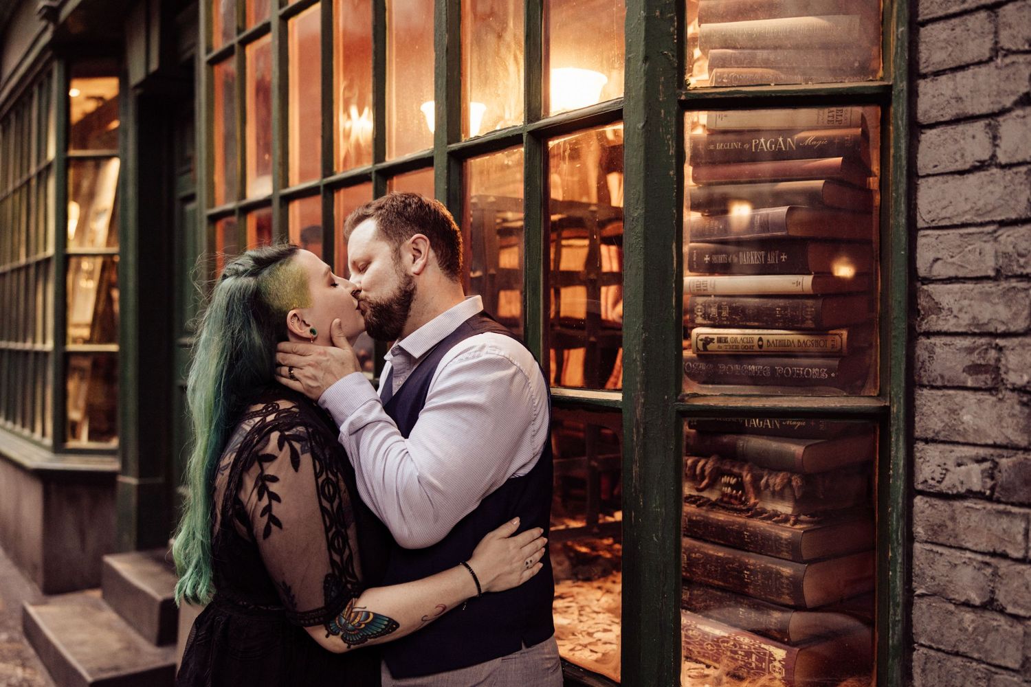 A tender embrace outside a vintage bookstore with warm glowing windows.