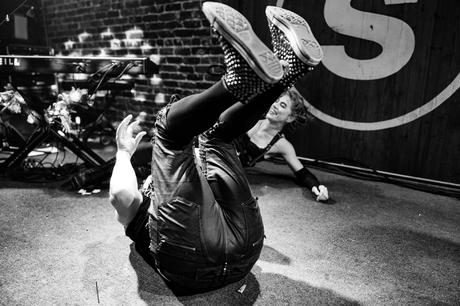 Brian Viglione, Dresden Dolls, The Social Orlando FL, June 18 2023, rolling on stage floor in dramatic performance moment