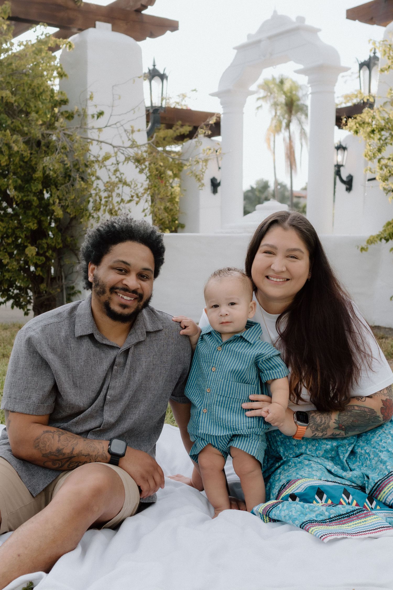 parents celebrating child's first birthday. family session historic old northeast st.petersburg florida near coffee pot bayou