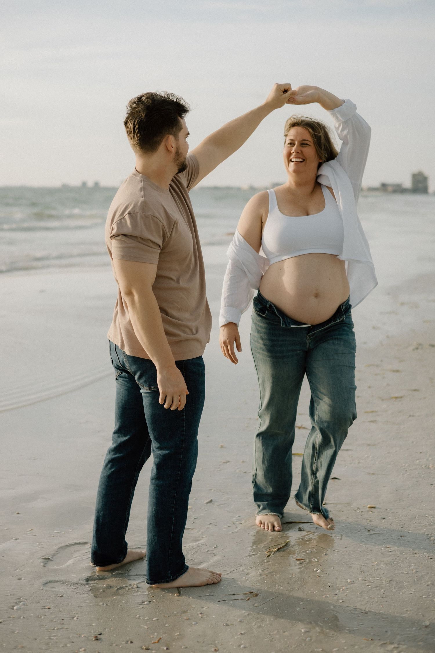 expecting parents sharing a quiet moment during a documentary-inspired maternity session.