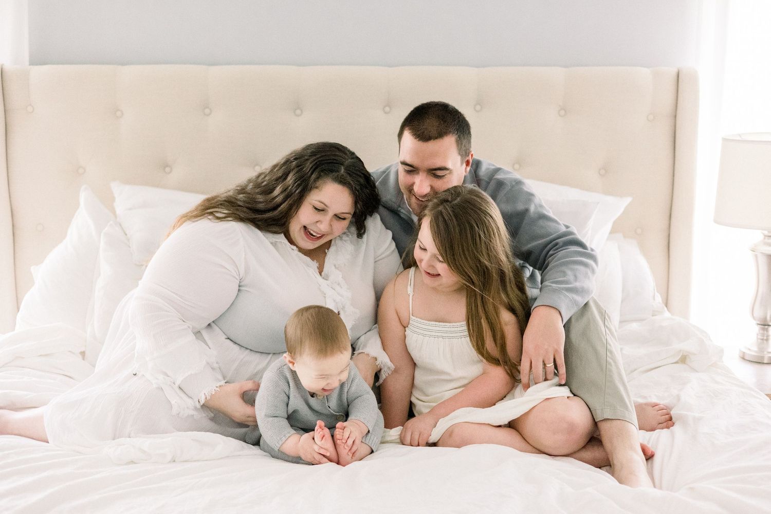 Augusta lifestyle family photographer capturing real connection between parents and toddler during a relaxed session
