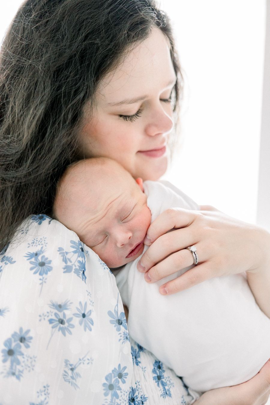 Fine art newborn photography, Augusta GA photographer, baby on white bedding, cozy in-home baby session, relaxed newborn photos