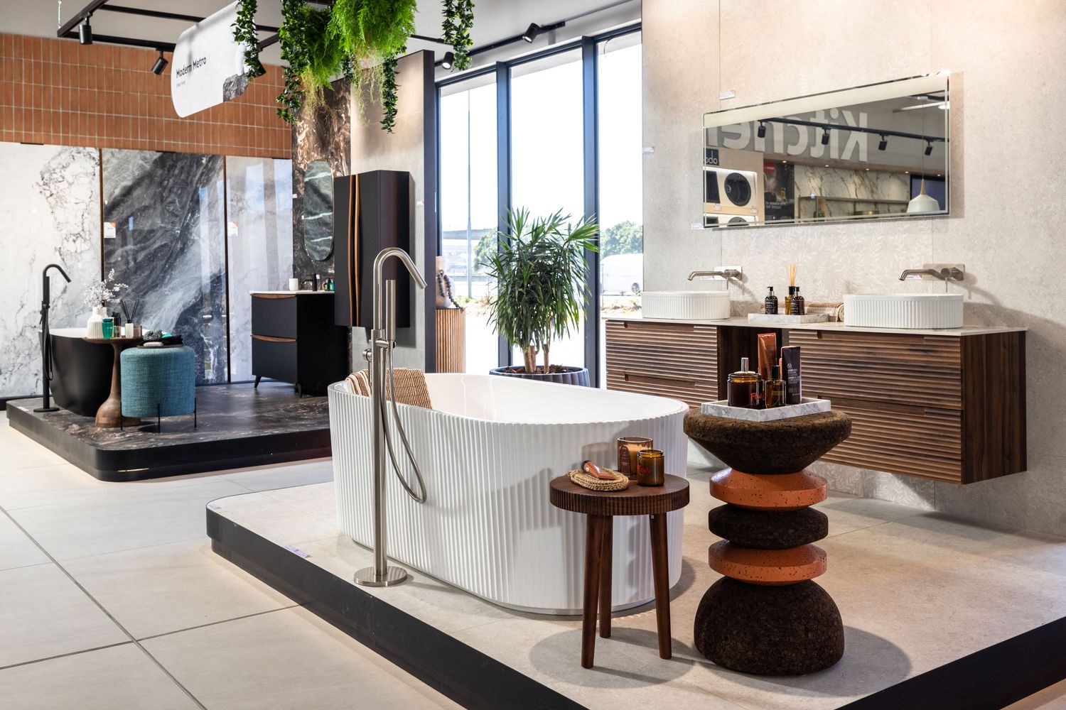 Modern kitchen interior design featuring sleek appliances, wood accents, and minimalist decor with natural lighting.
