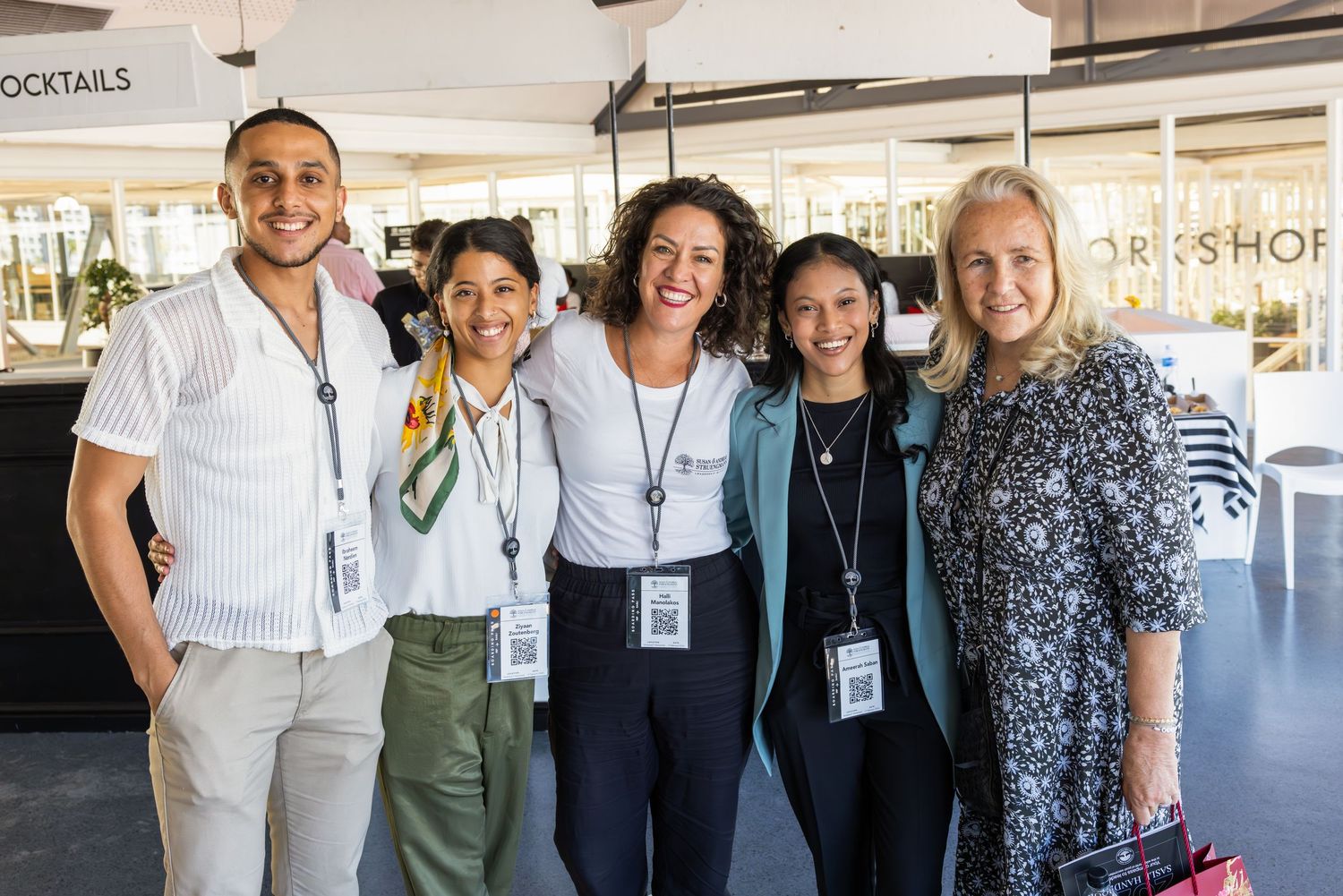 Group photos showing networking and conversations at a professional conference or event.