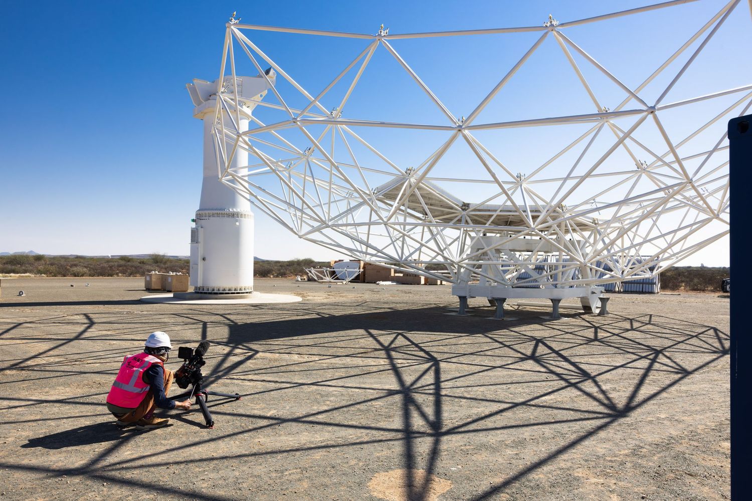 Metal framework and support structures for satellite dishes in desert environment.