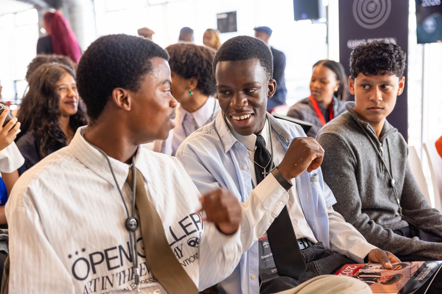 Attendees engaged in conversation at a business networking event.