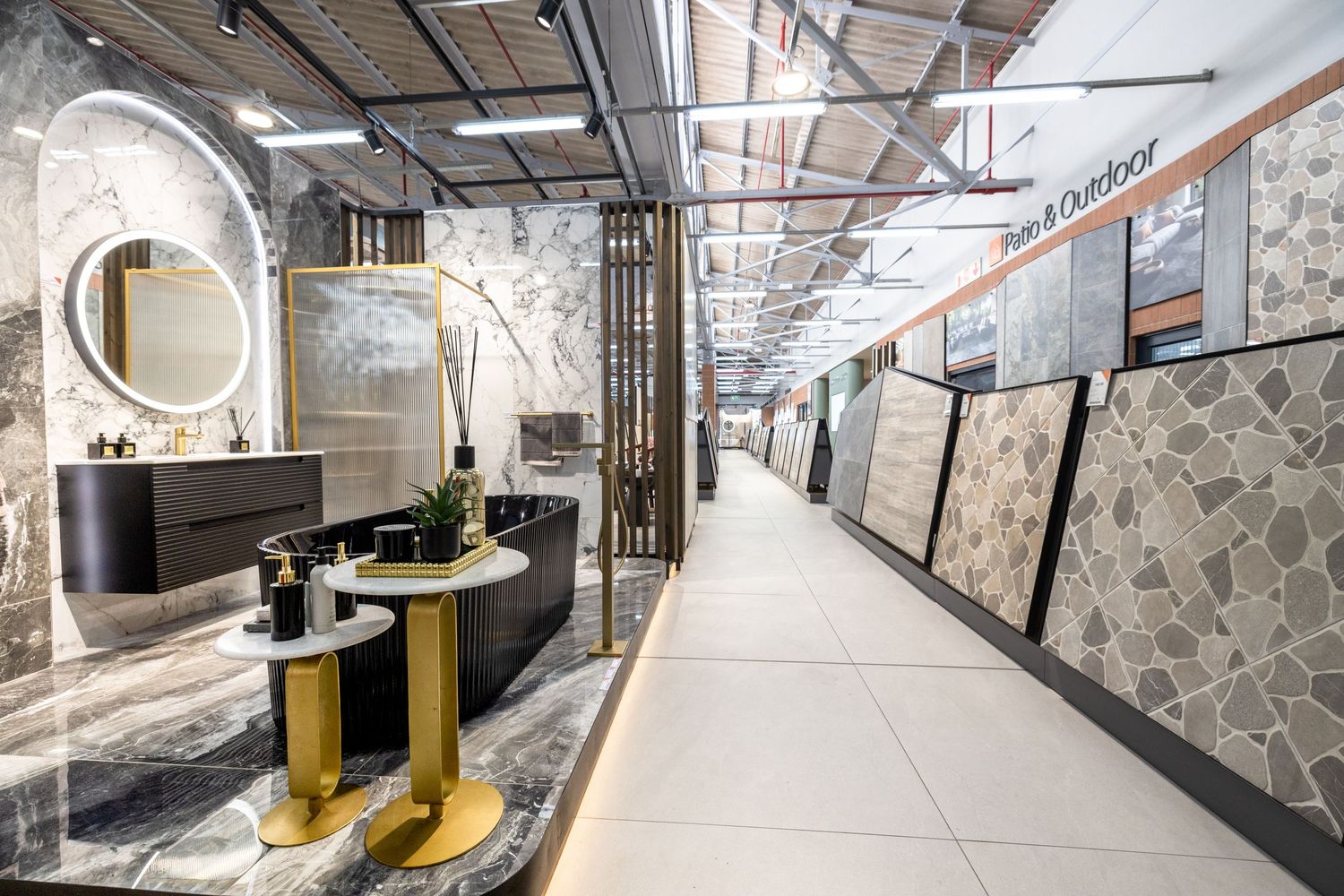 Modern subway station corridor with stone walls, yellow safety strips, and bright lighting creating a clean aesthetic.