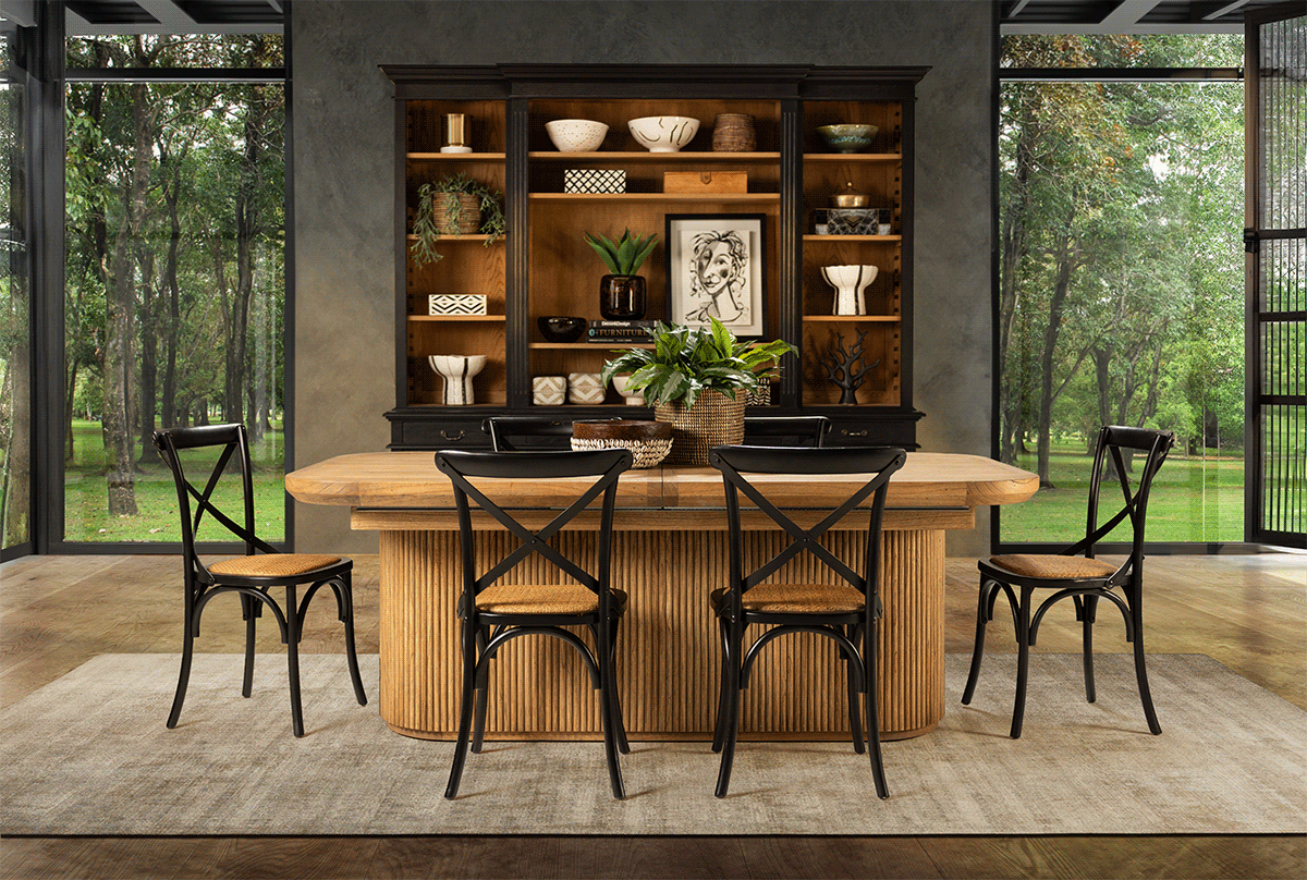 Modern dining room with rustic wooden table and black chairs showcasing elegant interior design.