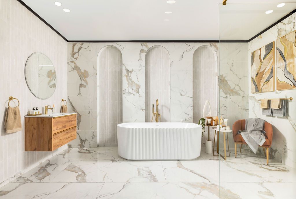Luxurious bathroom interior with marble walls, freestanding tub, and modern fixtures showcasing elegant design details.