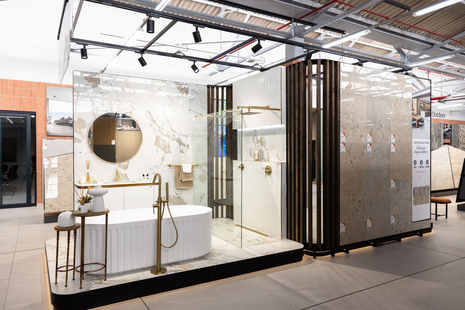 Modern office interior with sleek glass partitions, track lighting, and minimalist design elements.
