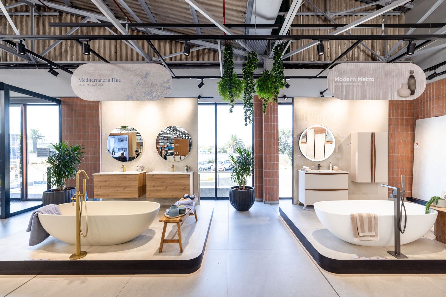 Contemporary workspace featuring minimalist furniture, natural lighting, and open concept design with wood accents.
