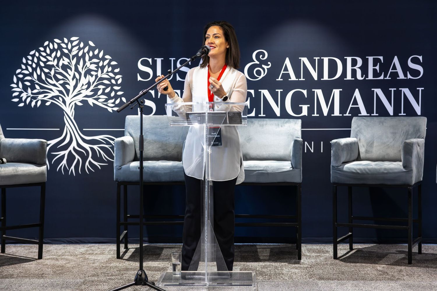 Professional conference space with Susan & Andreas Struengmann branding and modern seating arrangements.